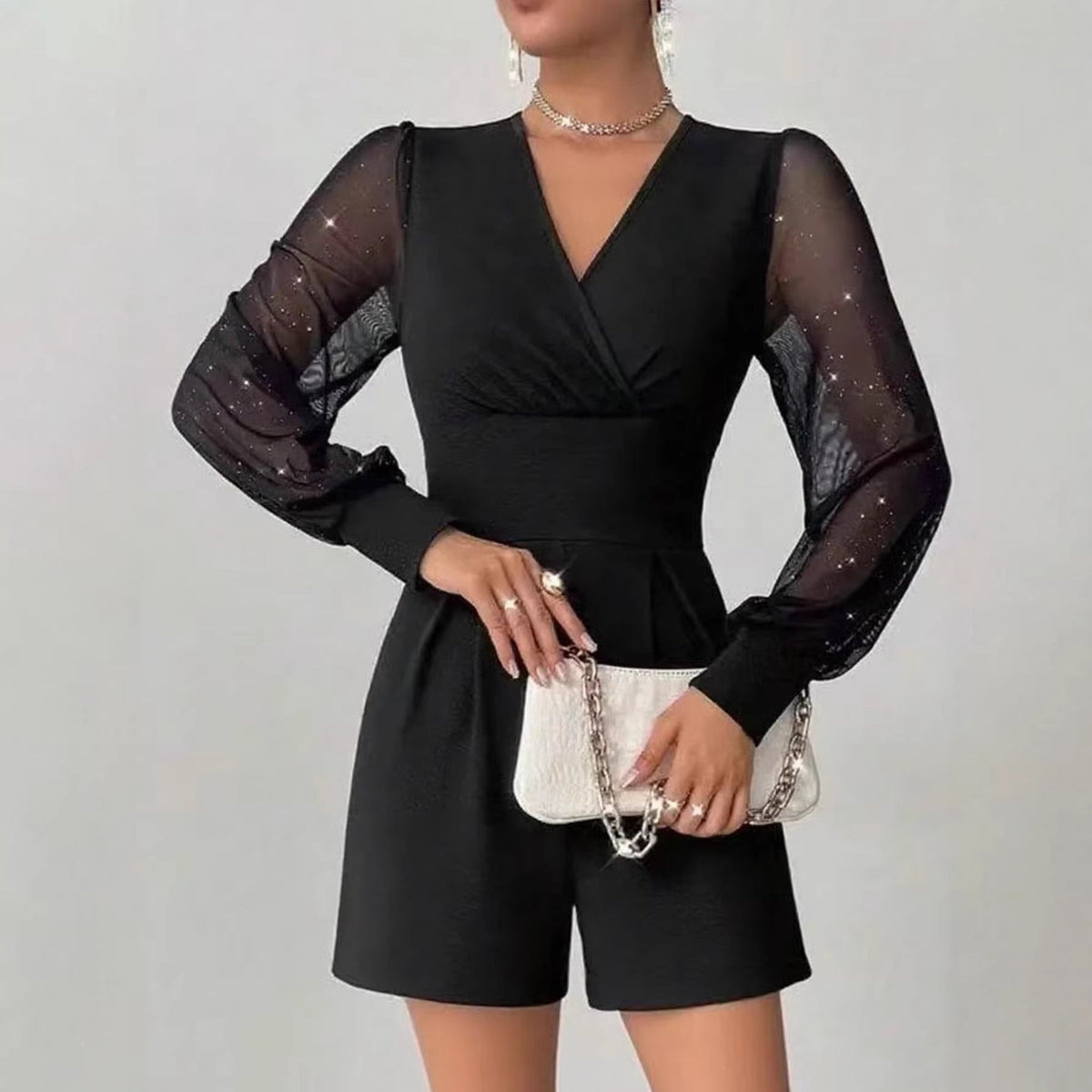 Jumpsuit Damen mit Wickeldetail und Puffärmeln in Schwarz - 3 - Annoboutique