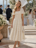 Elegantes Midi-Kleid für Damen mit floralem Muster und Puffärmeln - J&B - 1 - Annoboutique