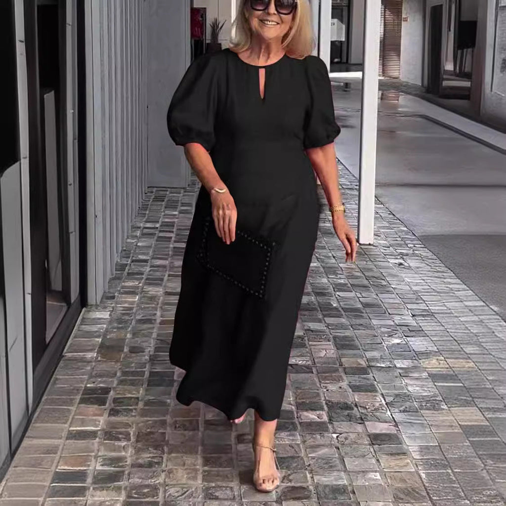 Clara – Lockeres Maxikleid mit Puffärmeln und Rundhalsausschnitt