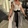 Dirndl mit Flügelärmeln und Samtschleife