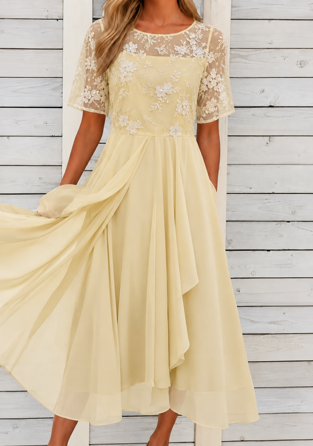Feminines Midikleid mit zarter Spitze