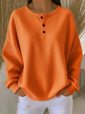 Mila – Strukturiertes Longsleeve mit Knopfleiste Damen