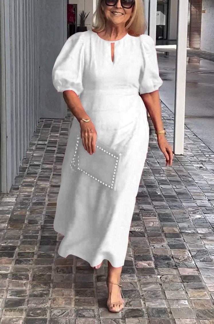 Clara – Lockeres Maxikleid mit Puffärmeln und Rundhalsausschnitt