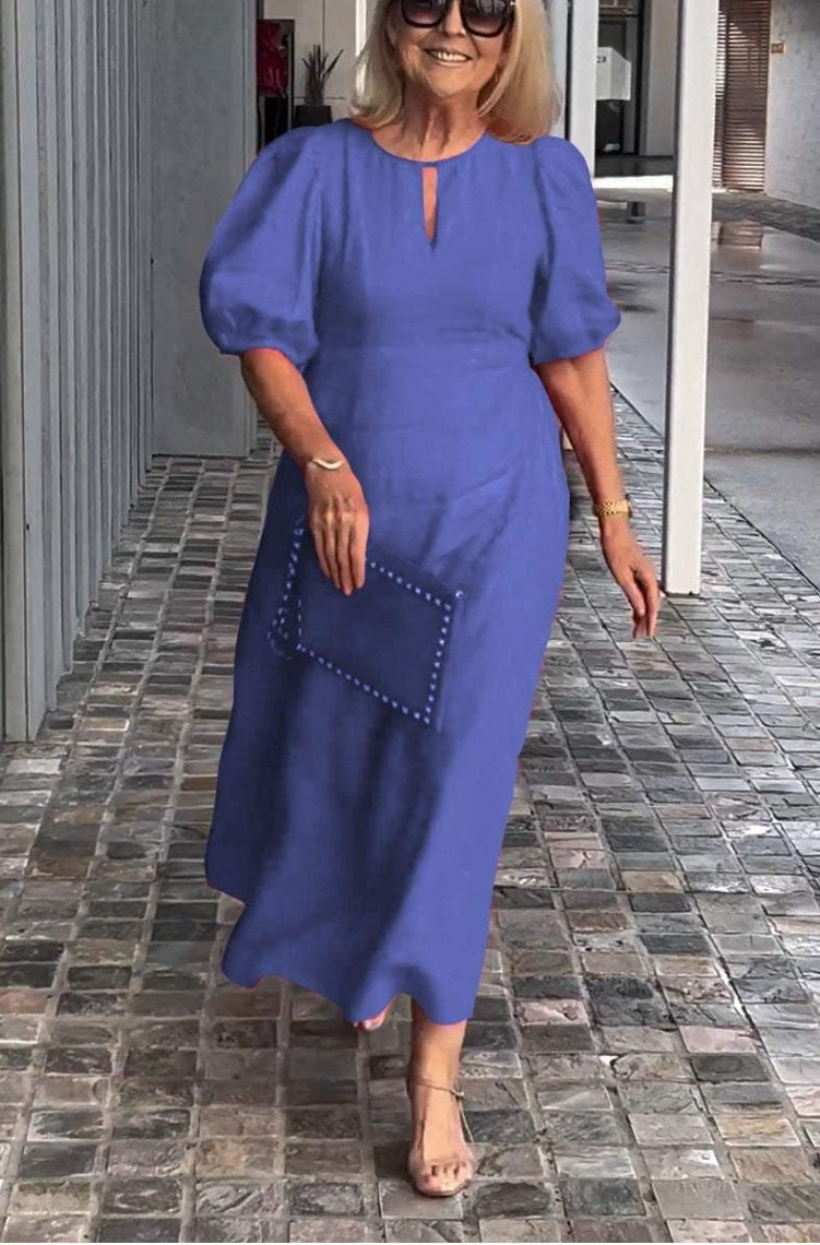 Clara – Lockeres Maxikleid mit Puffärmeln und Rundhalsausschnitt